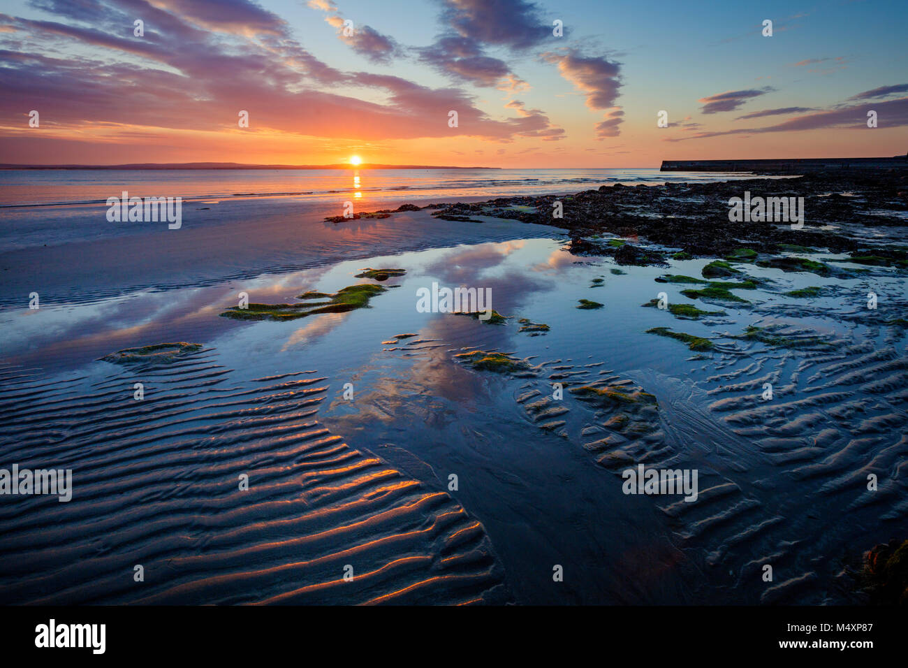 Coastal sunset from Enniscrone Beach, County Sligo, Ireland. Stock Photo