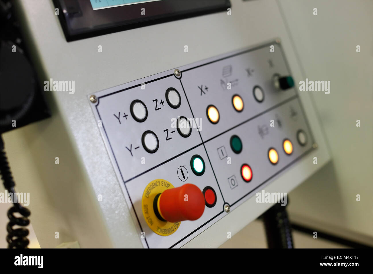 Control panel of CNC metalworking machine. Selective focus. Stock Photo