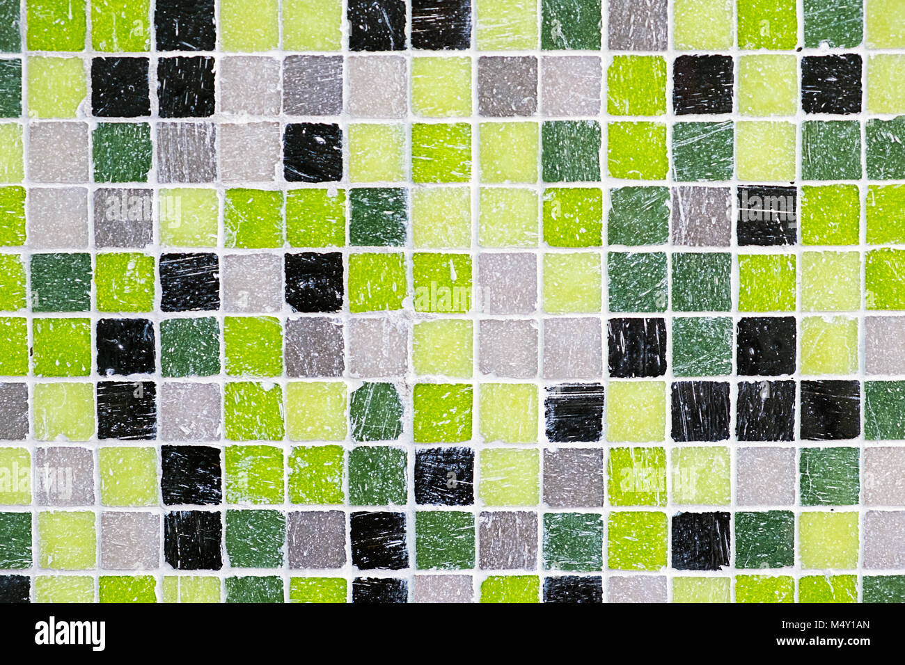 Background from green, black and grey mosaic tiles Stock Photo