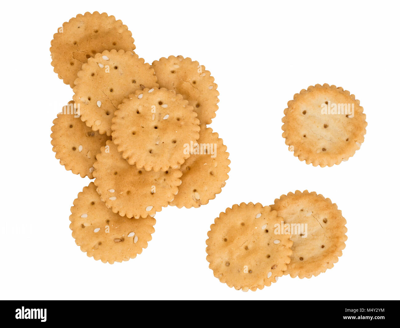 Gluten free crackers. Small tasty savoury biscuits with sesame seeds. Stock Photo