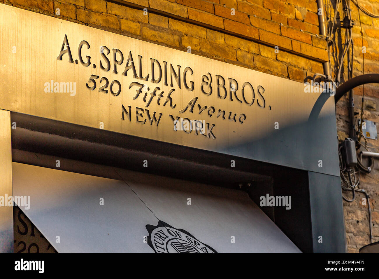 RAVENNA, ITALY - FEBRUARY 15, 2018: A.G. SPALDING AND BROS. sign of street shop. Spalding Sporting Goods Ltd owner of the brand granted license to Ita Stock Photo