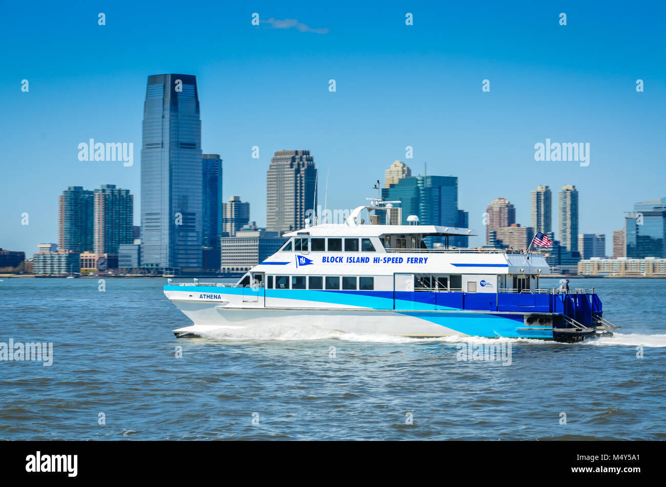 Block Island Hi-Speed Ferry cruising Hudson River in front of downtown Manhattan. Stock Photo