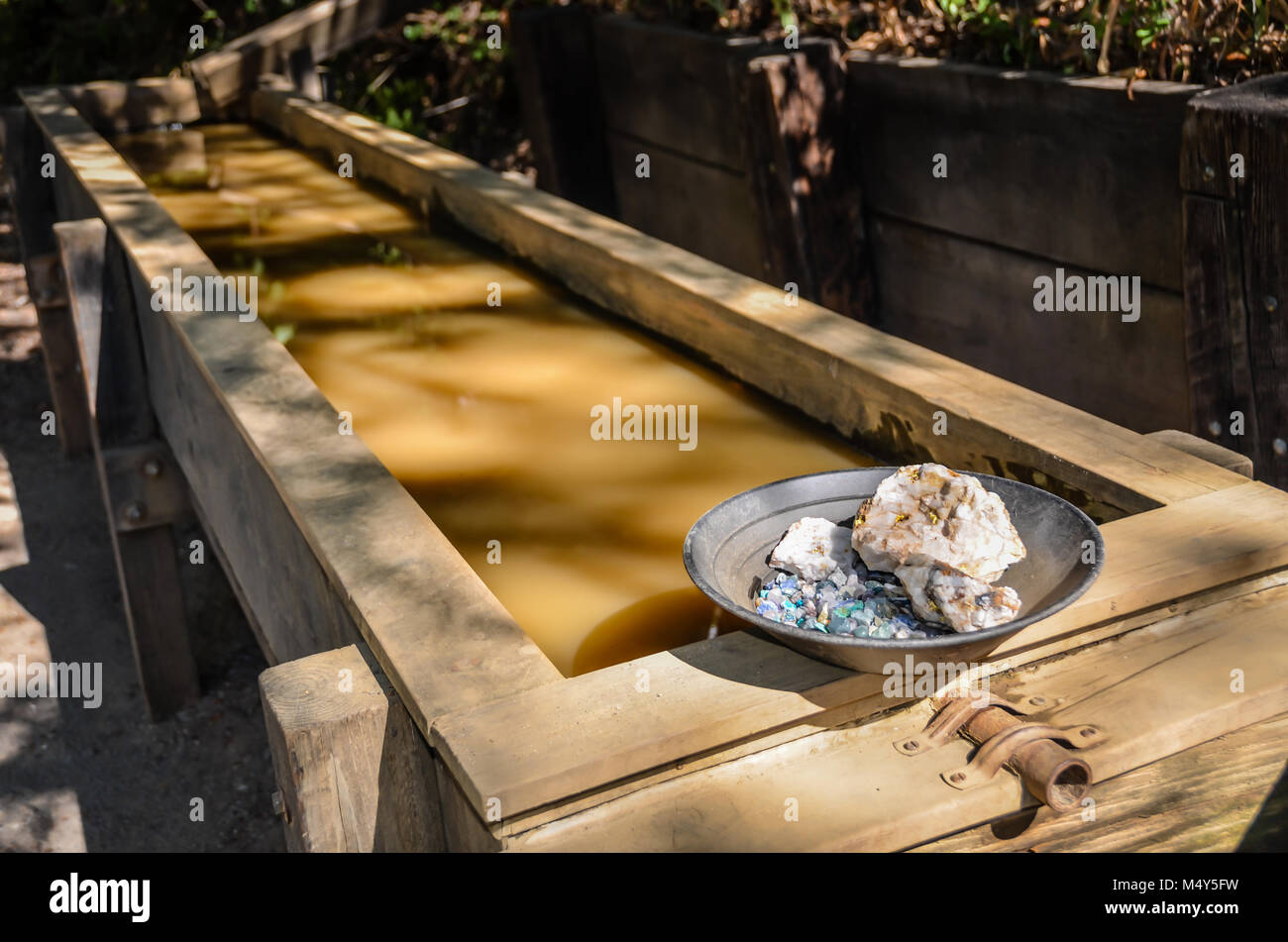 Gold panning exhibit with sluicing station at the Gold Bug Mine in Sacramento, CA. Stock Photo