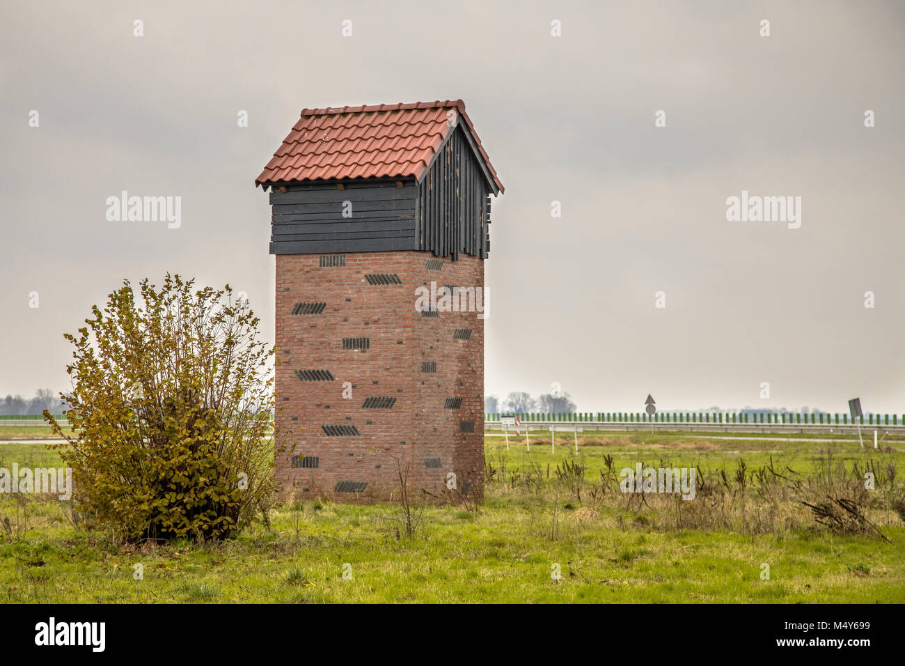EEMSHAVEN,NETHERLANDS - NOVEMBER 22, 2017: Bat house tower for protection and housing of pipistrelle bats in the Netherlands Stock Photo