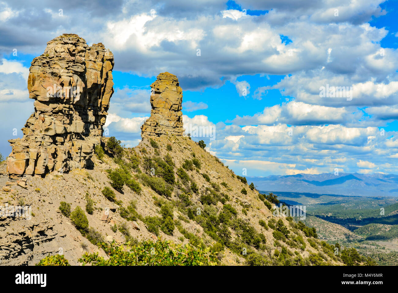 Horizontal view of two spires at Chimney Rock National Monument in San Juan National Forest in southwestern Colorado. Stock Photo