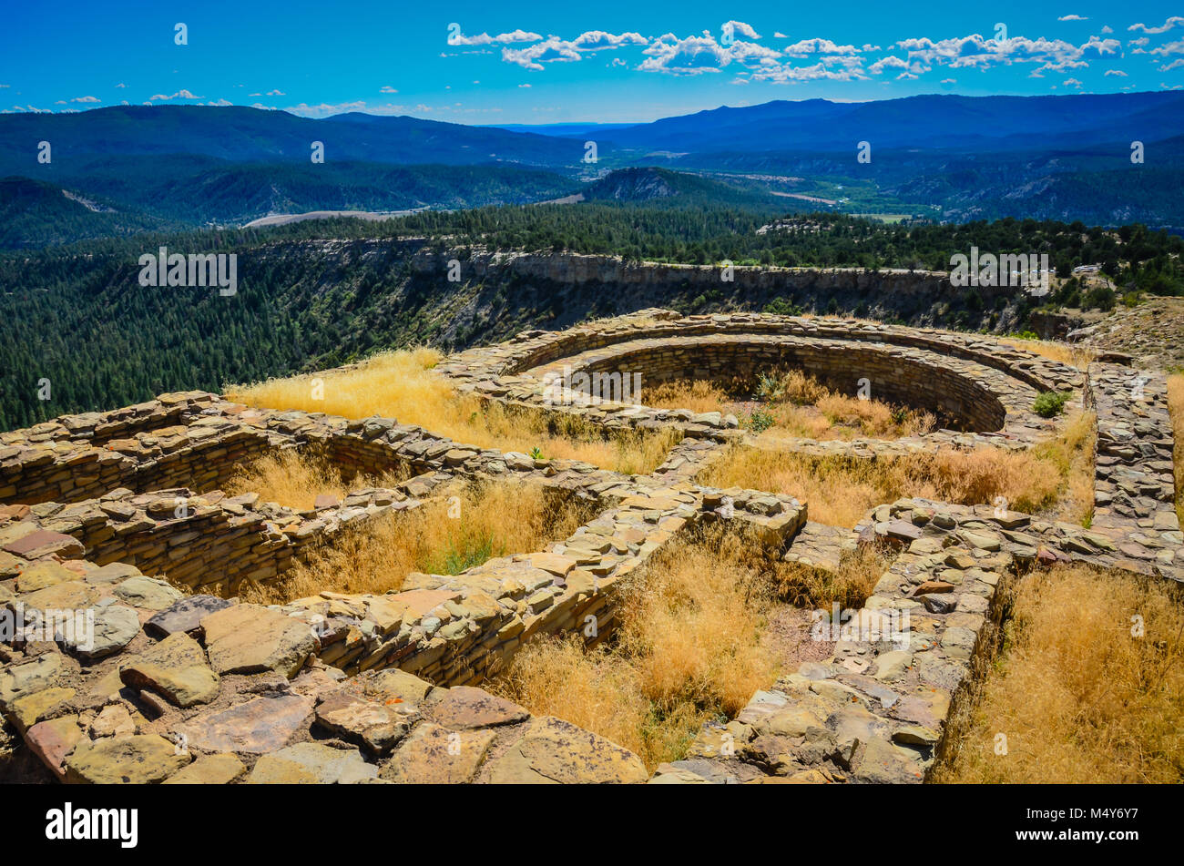 Ancient ruins of Great Kiva at Chimney Rock National Monument in San Juan National Forest in southwestern Colorado with far off view of Chaco Canyon. Stock Photo