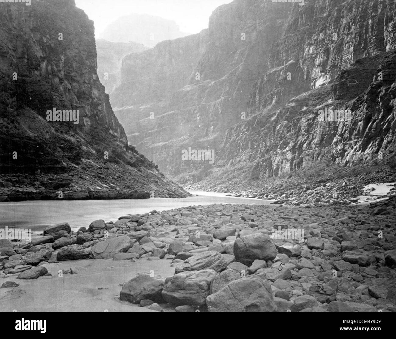 'COLORADO RIVER FROM MOUTH OF KANAB CREEK LOOKING WEST'.  FROM THE 1872 GEORGE M. WHEELER EXPEDITION.  W. BELL PHOTO, 1872.  .  CATALOG # GRCA 13895    Grand Canyon Nat Park Historic River Photo. Stock Photo