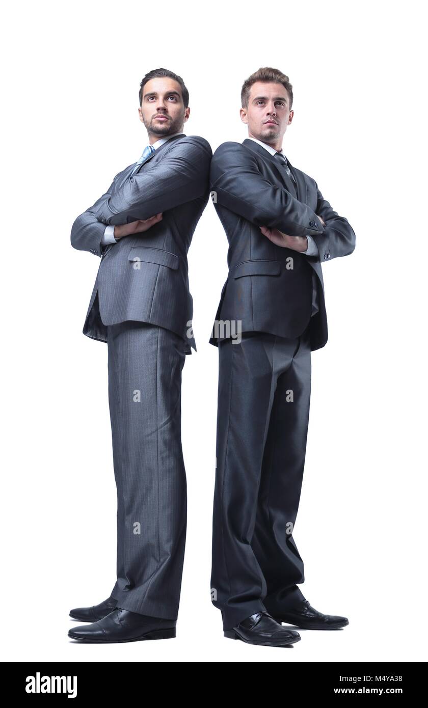 two business partners standing back to back Stock Photo - Alamy