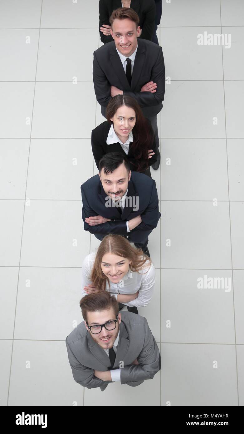 business team standing in a column on a white background Stock Photo ...