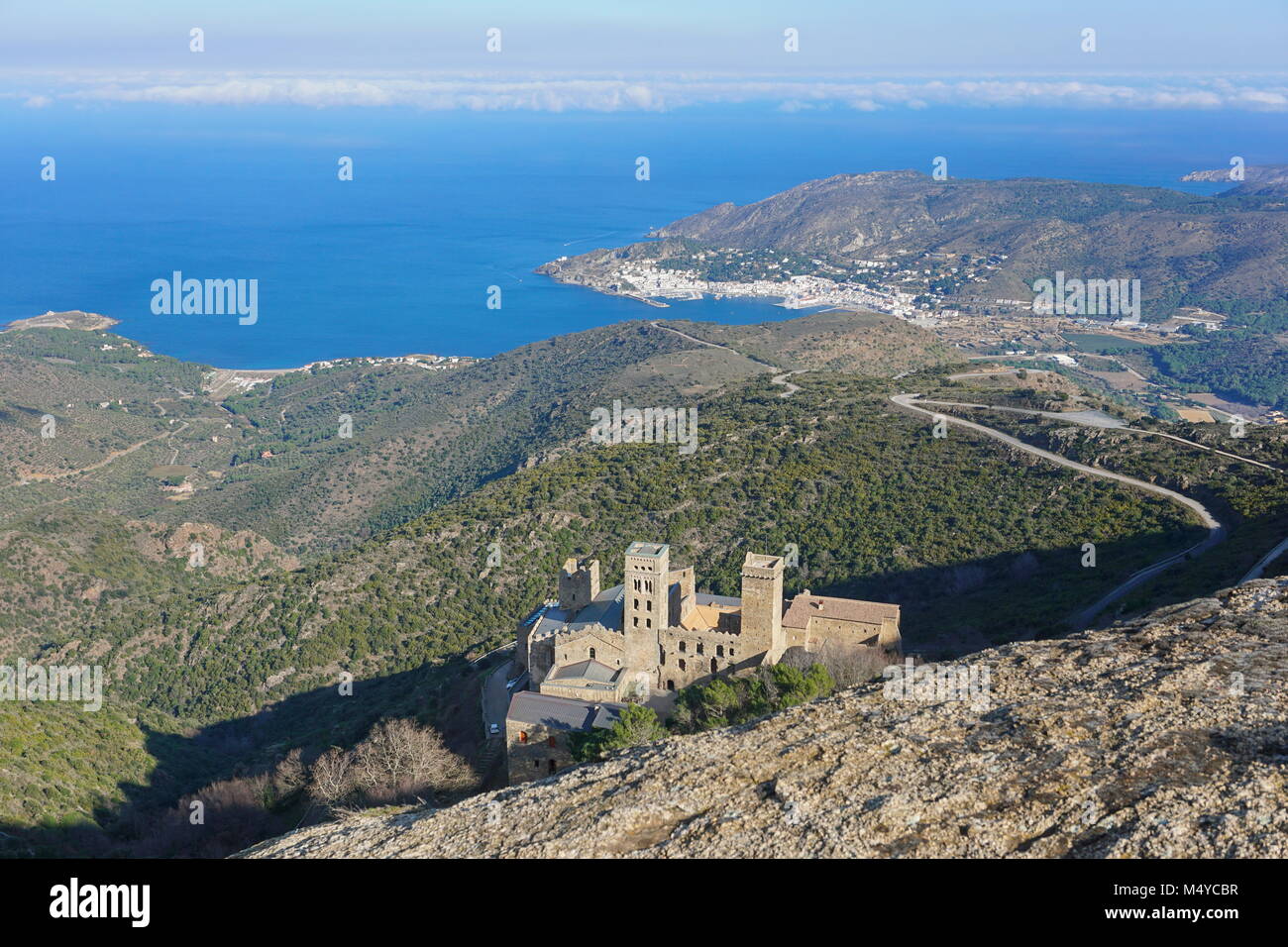 Spain Costa Brava landscape, the monastery Sant Pere de Rodes overhanging the seaside town El Port de la Selva, Catalonia, Girona, Mediterranean sea Stock Photo