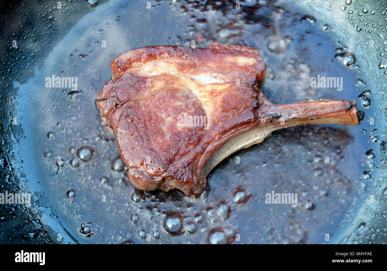 fresh lamb ribs cooking steak or grill in red wine Stock Photo