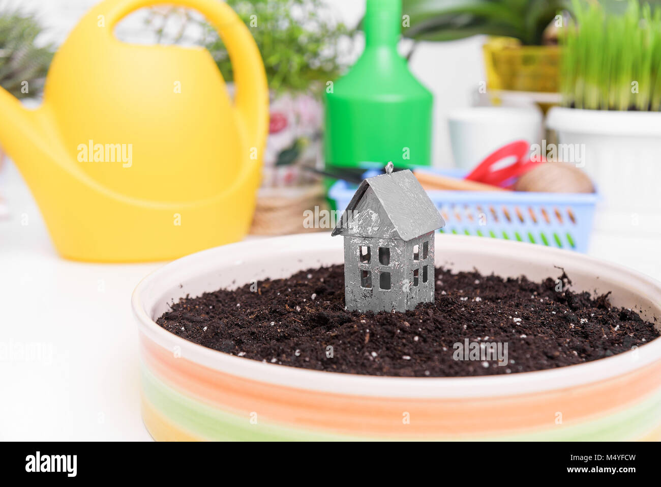 Model of the house on the ground. Stock Photo