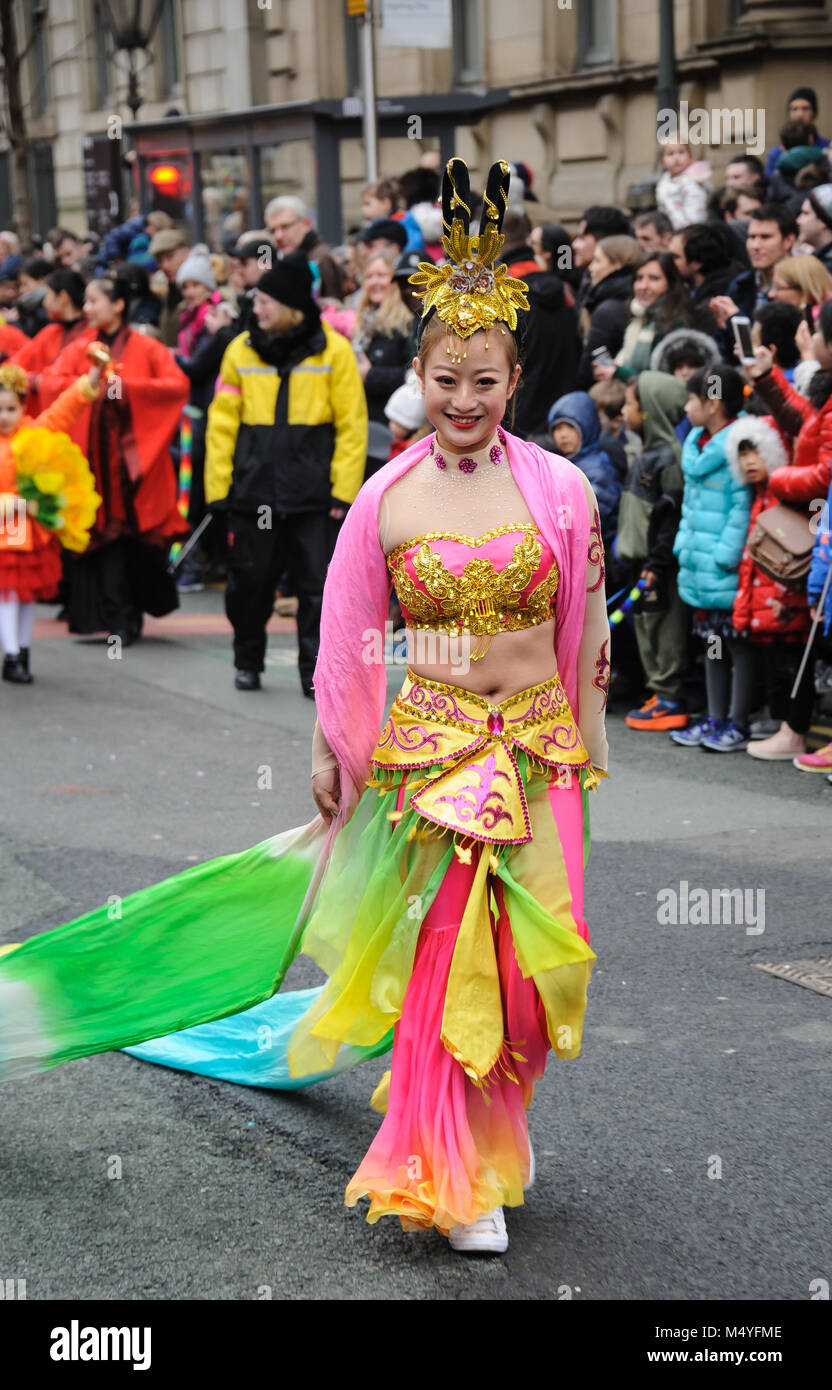 Chinese New Year 2018 Year of the Dog Festival in Manchester UK. Chinese woman in festival dress Stock Photo Alamy