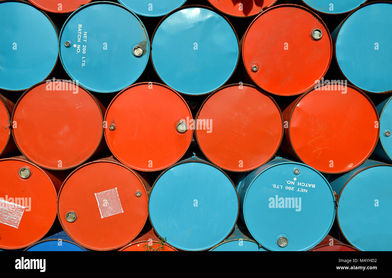 colorful of old oil tanks after uesd at outdoor junk place photo in sun lighting Stock Photo Alamy
