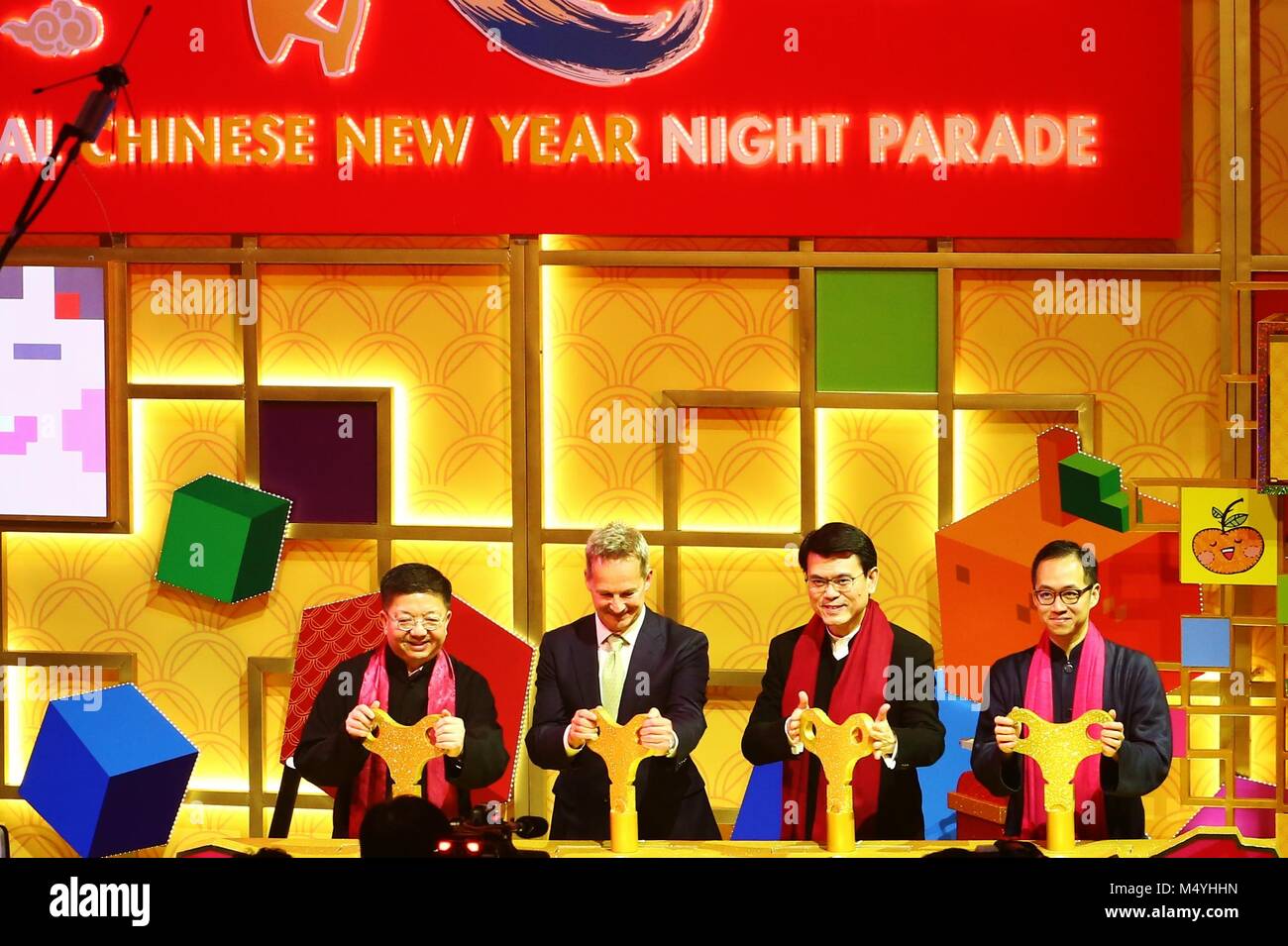 Hong Kong, Hong Kong - February 16, 2018. The annual Chinese New Year Night Parade 2018 takes place in the Tsim Sha Tsui area of Hong Kong. (L-R): the Executive Director of the HK Tourism Board Mr. Anthony Lau; the Chief Executive  Officer of Cathay Pacific Mr.Rupert Hogg; the Secretary for Commerce and Economic Development Mr.  Edward Yau; and the Chairman of Product and Event Committee of the HK Tourism Board, Mr. Paulo Pong,  seend during the opening ceremony of the Chinese New Year Parade. Stock Photo