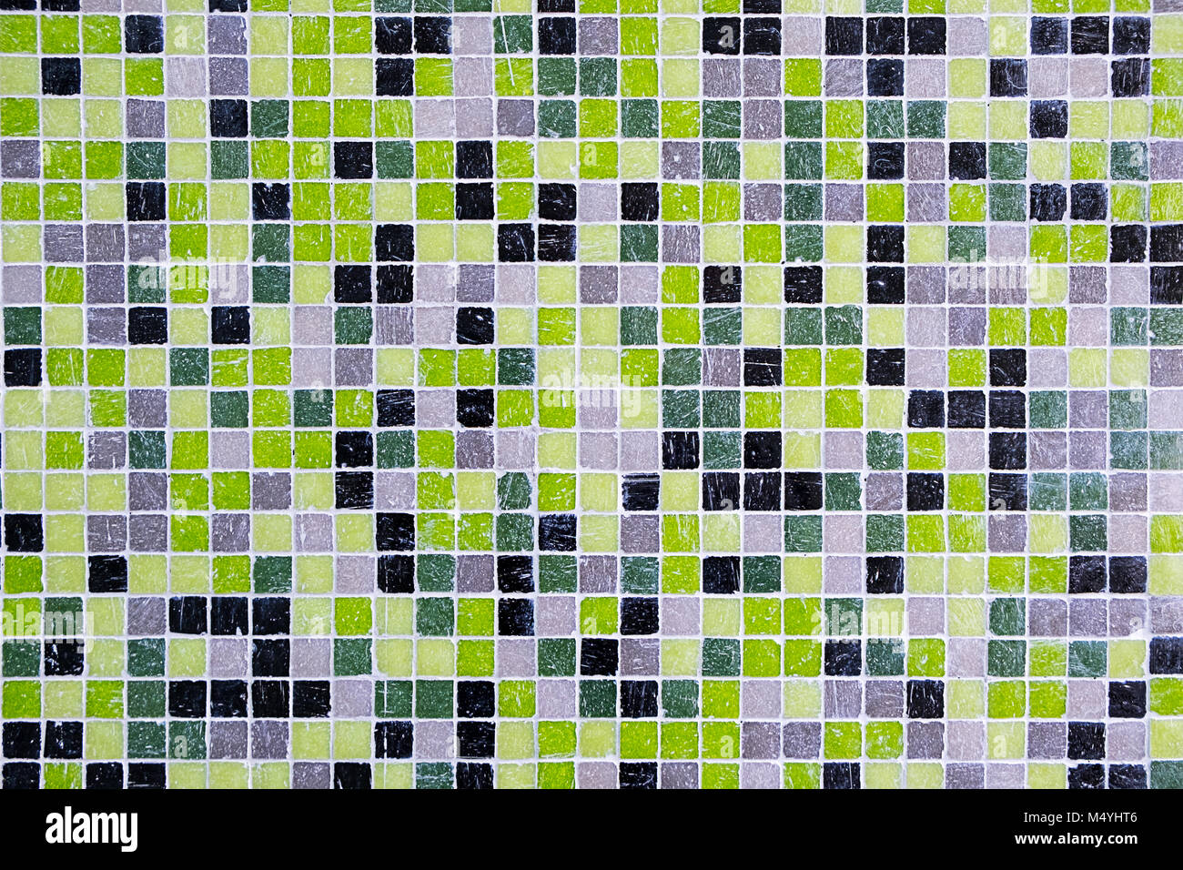 Background from black, green and grey mosaic tiles Stock Photo
