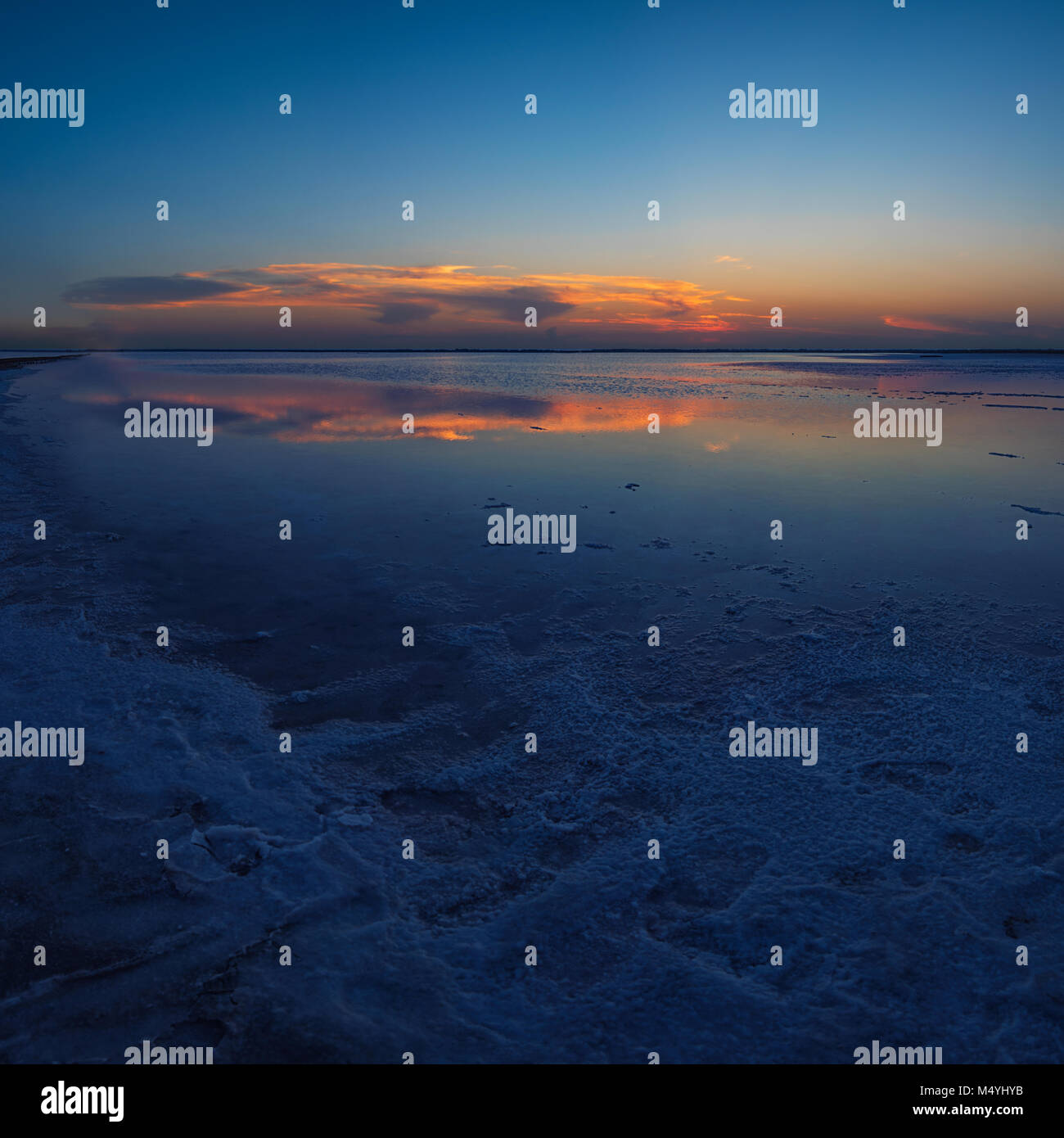 Beauty sunset on salty lake Stock Photo - Alamy