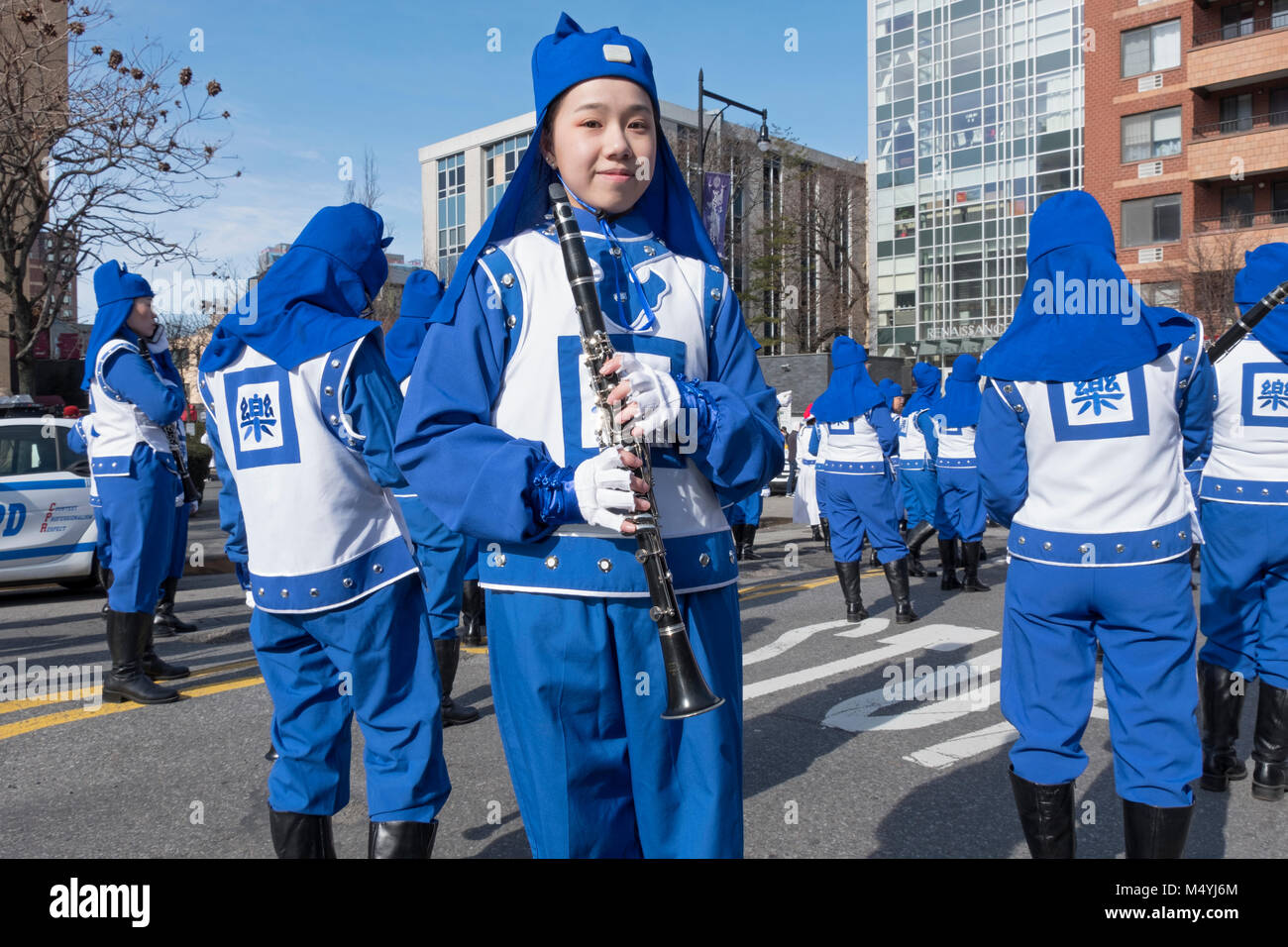 A clarinet player with the Falun Dafa marching band at the Chinese New Year Parade in Flushing, Queens, New York City Stock Photo