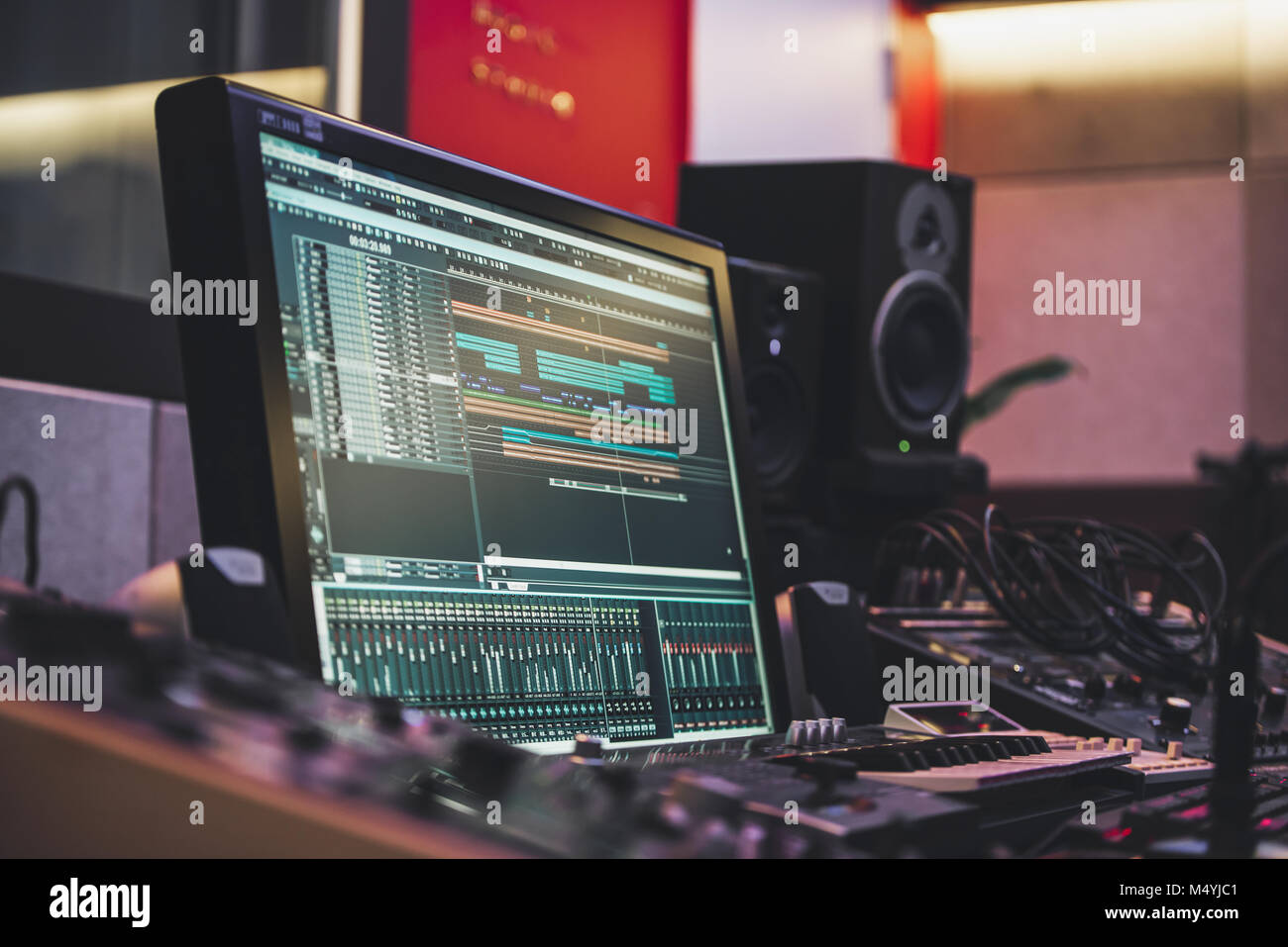 Closeup of mixing deck and monitor Stock Photo