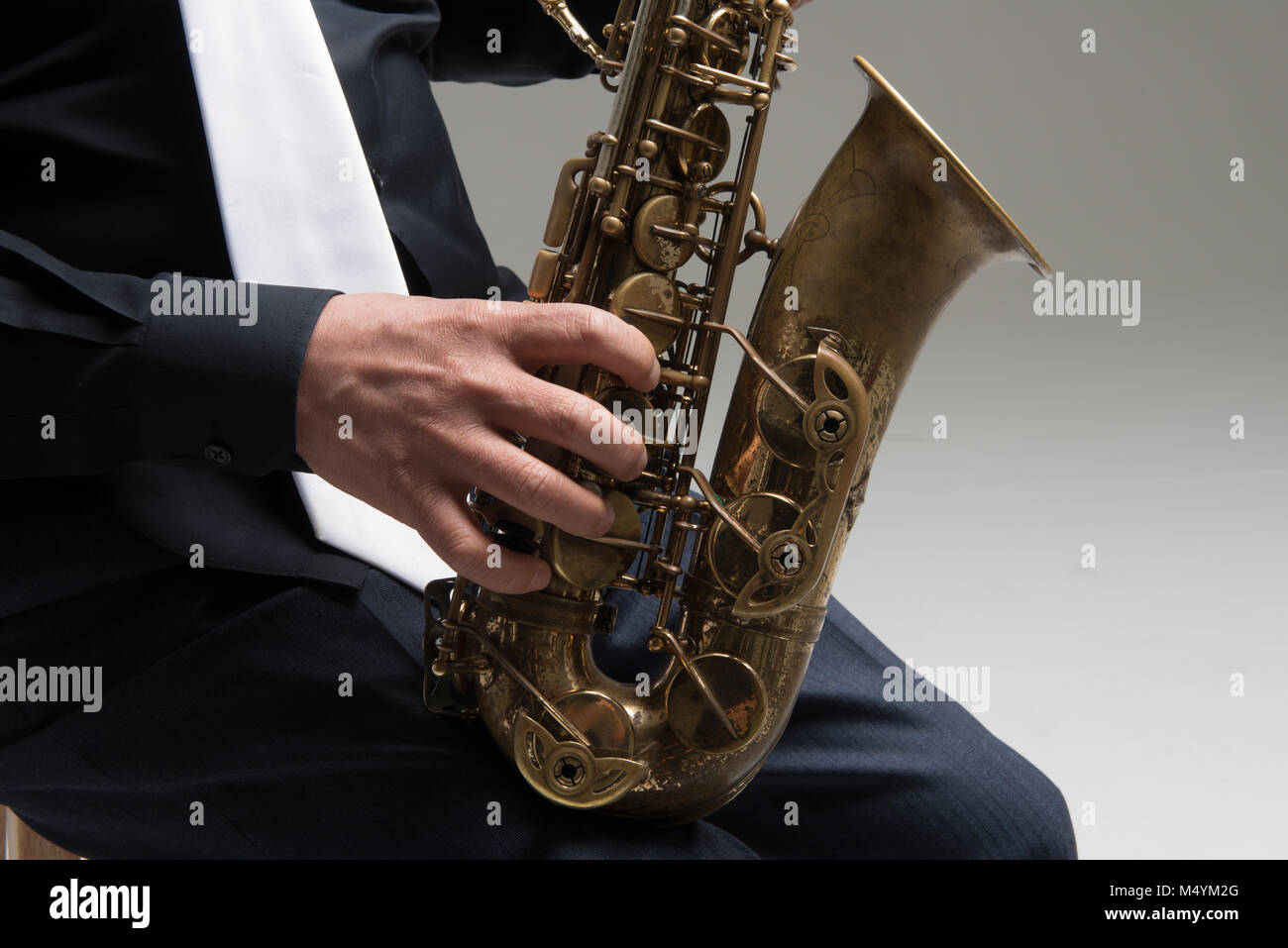 Hands of saxophone player Stock Photo Alamy