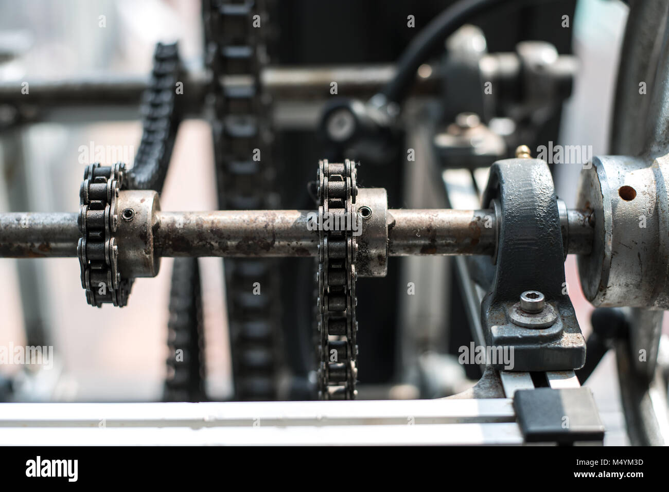 Moving machine with chain and gear Stock Photo Alamy