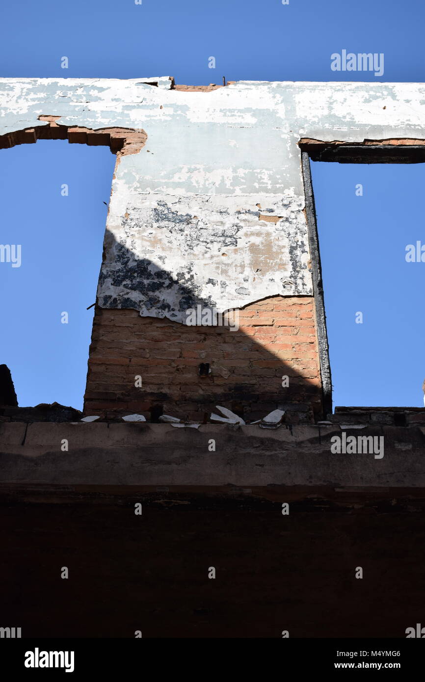 Demolition building blasting the blue sky through windows or the roof ...