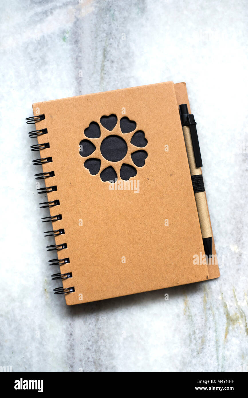 Notebook lie on a marble background, from above Stock Photo - Alamy