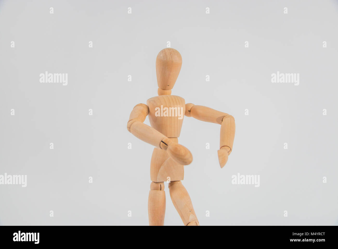 Wooden drawing puppet posing Stock Photo
