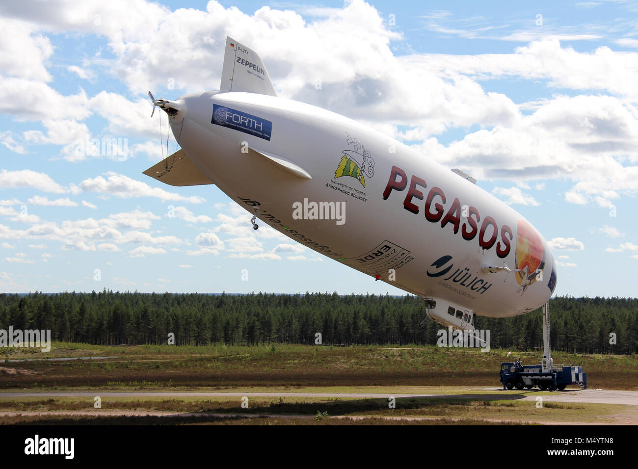 JAMIJARVI, FINLAND - JUNE 15, 2013: Pegasos Zeppelin NT airship attached to mast in Jamijarvi, Finland on June 15, 2013 after completing the ca. 30 re Stock Photo