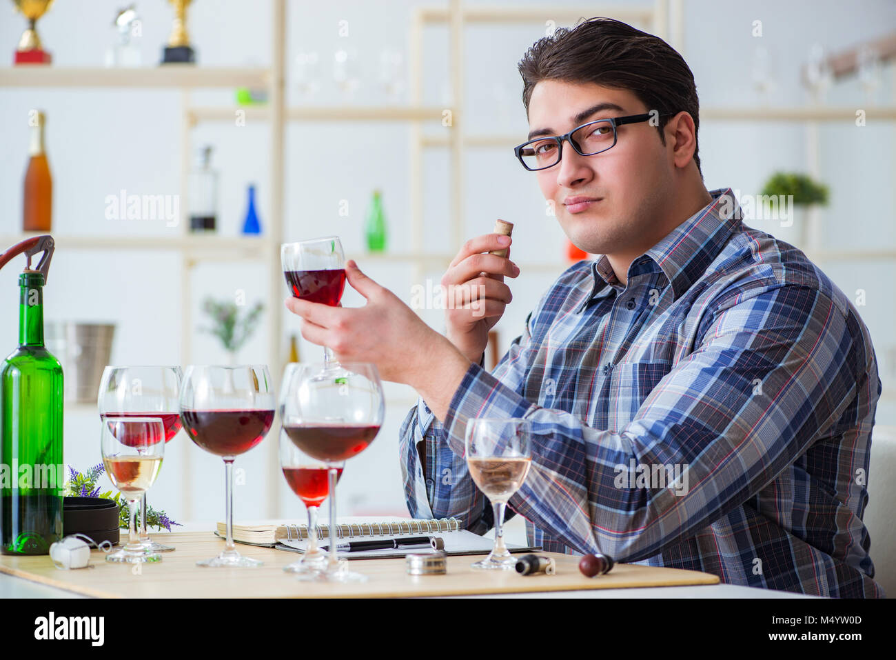 Professional sommelier tasting red wine Stock Photo Alamy