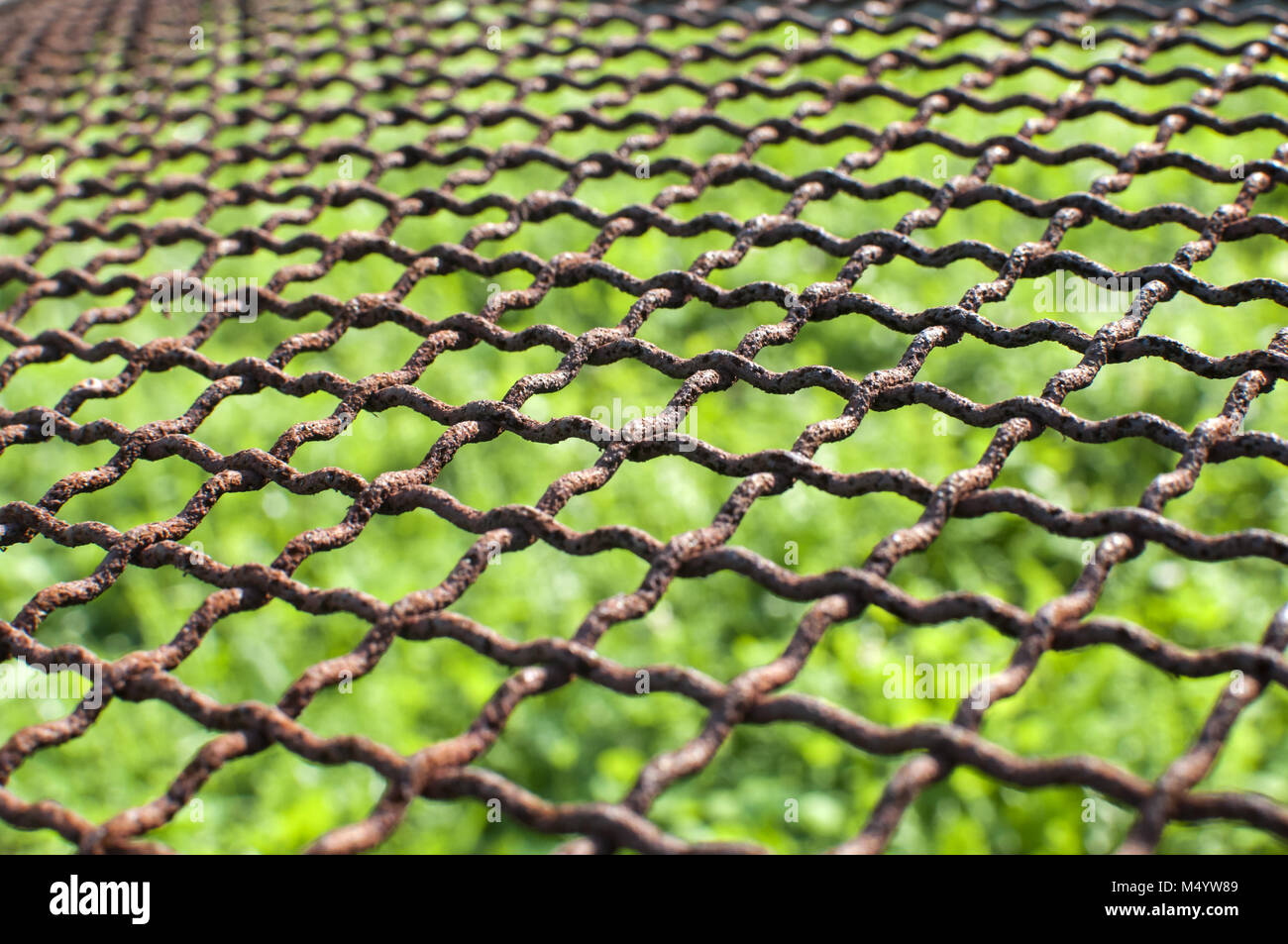 Old weathered wire fencing net Stock Photo
