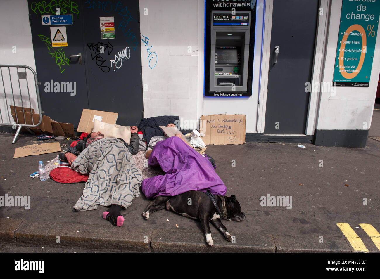 London, United Kingdom. Homeless sleeping rough in front of  Eurochange. Stock Photo