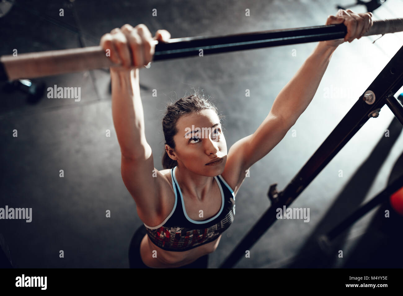 Girl doing pull ups hi-res stock photography and images - Alamy