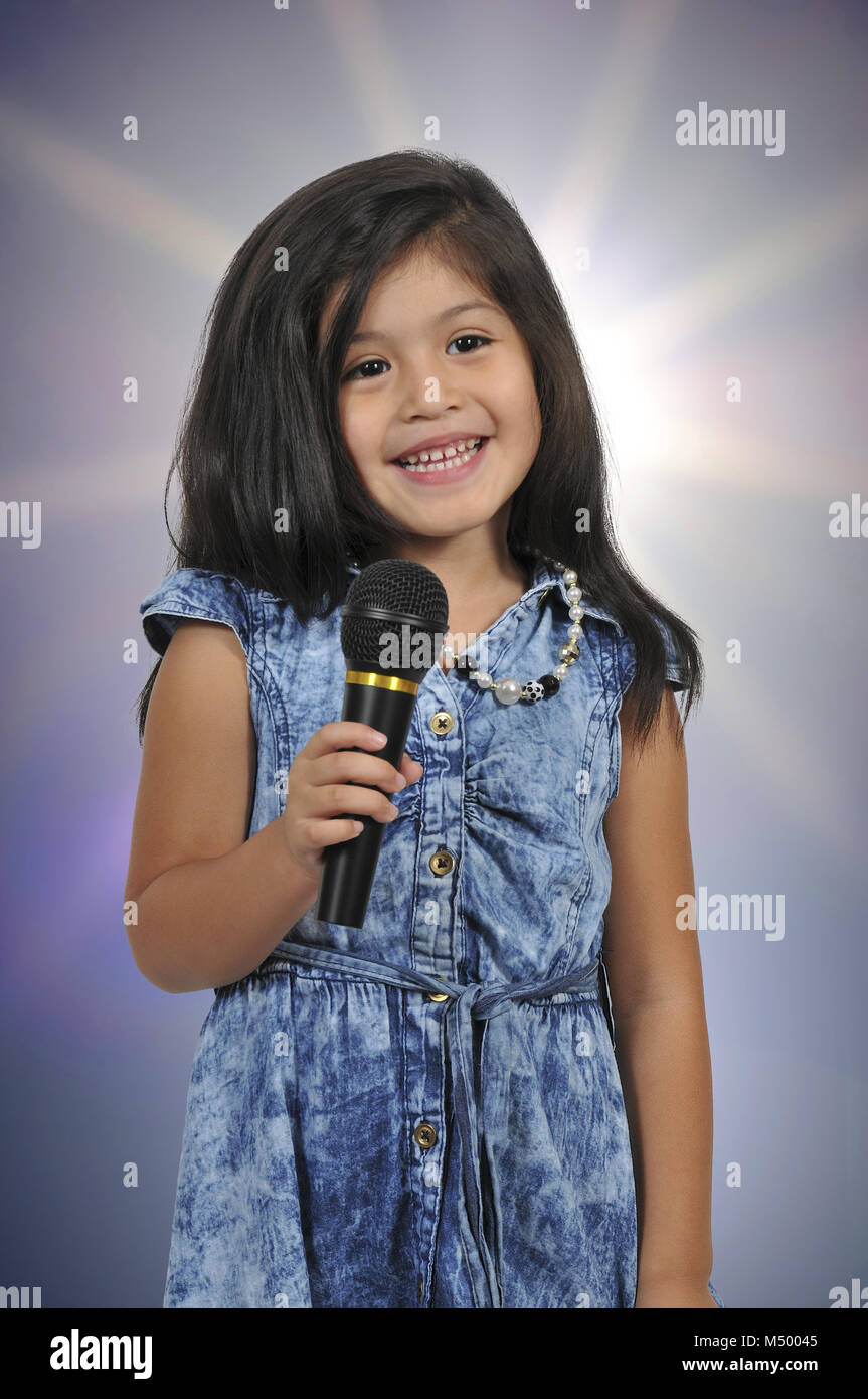 Little Girl Singer Stock Photo Alamy