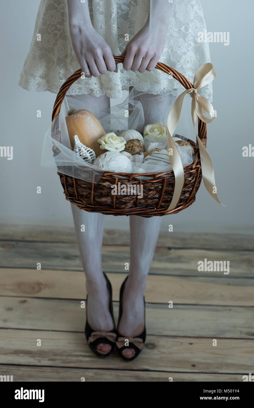 Halloween witch pick up basket with treats Stock Photo Alamy