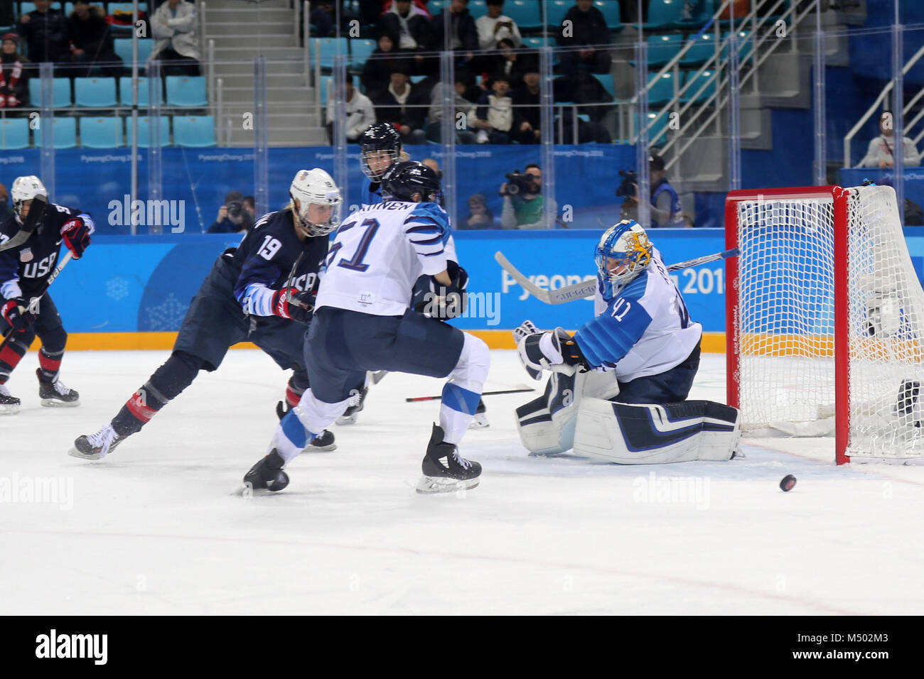 Gangneung, South Korea. 19th Feb, 2018. TANJA NISKANEN of Finland and goalkeeper ROONA RATY defend against GIGI MARVIN of USA during the Ice Hockey: Women's Play-offs Semifinals at Gangneung Hockey Centre during the 2018 Pyeongchang Winter Olympic Games. Credit: Scott Mc Kiernan/ZUMA Wire/Alamy Live News Stock Photo