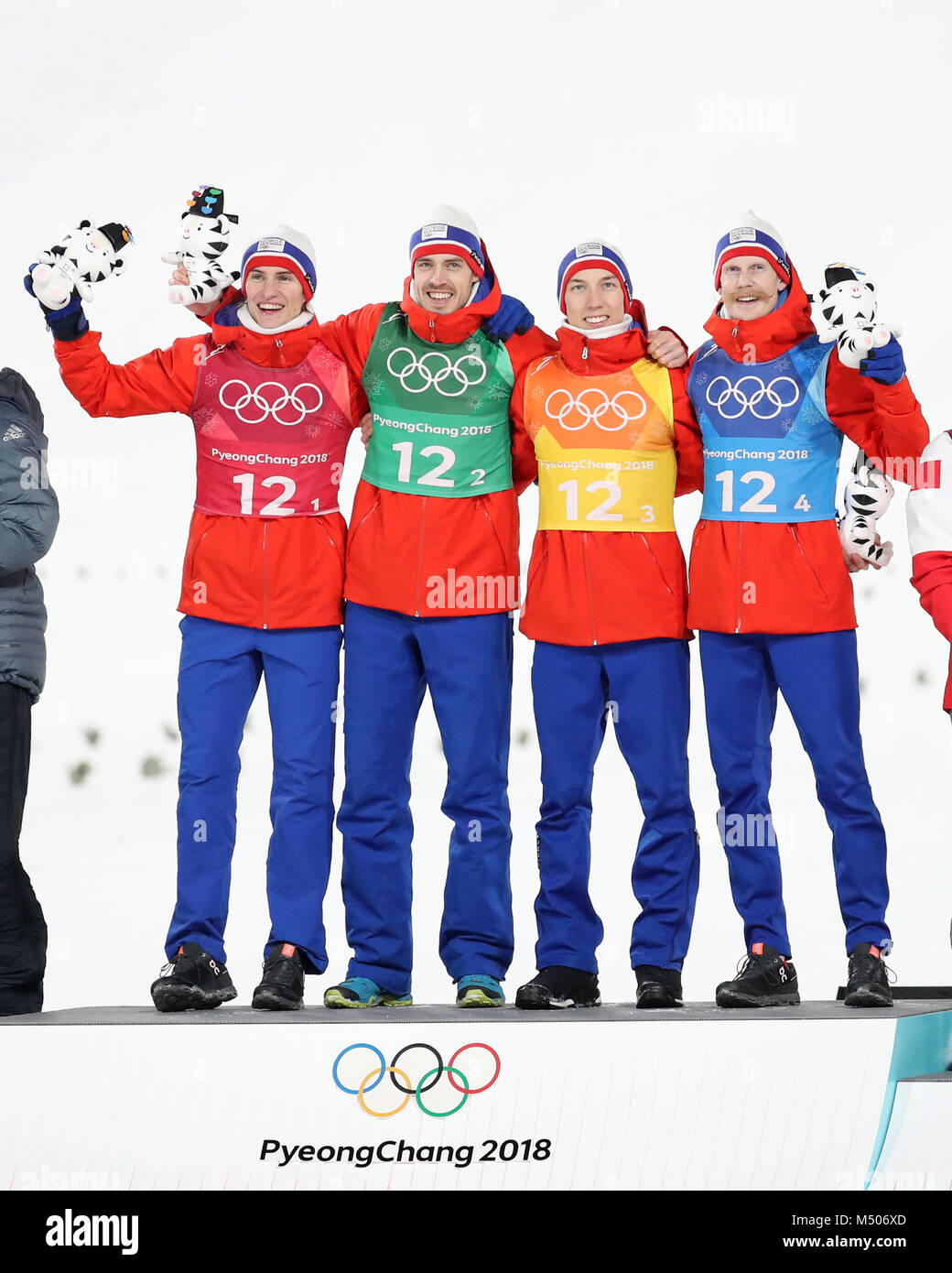 Pyeongchang, South Korea. 19th Feb, 2018. Team Norway's Daniel Andre Tande, Andreas Stjernen, Johann Andre Forfang and Robert Johansson (L to R) pose for photos during venue ceremony of men's team event of ski jumping at 2018 PyeongChang Winter Olympic Games at Alpensia Ski Jumping Centre, PyeongChang, South Korea, Feb. 19, 2018. Team Norway claimed champion with 1098.5 points. Credit: Li Gang/Xinhua/Alamy Live News Stock Photo