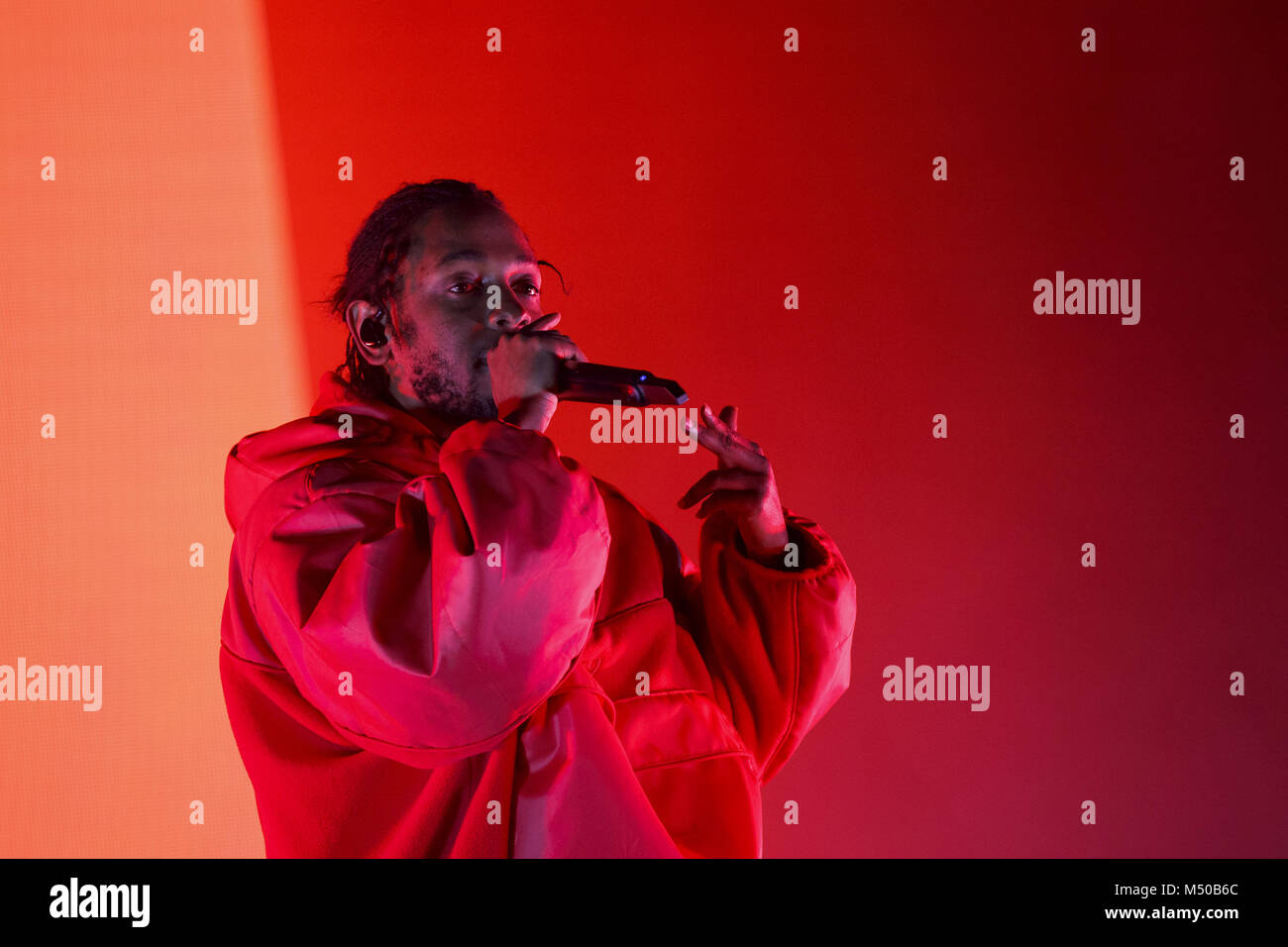 Los Angeles, CA, USA. 16th Feb, 2018. Fans react as artist Kendrick Lamar  performs at L.A. Live during the NBA All-Stars weekend road show concert on  Friday, February 16, 2018 in downtown