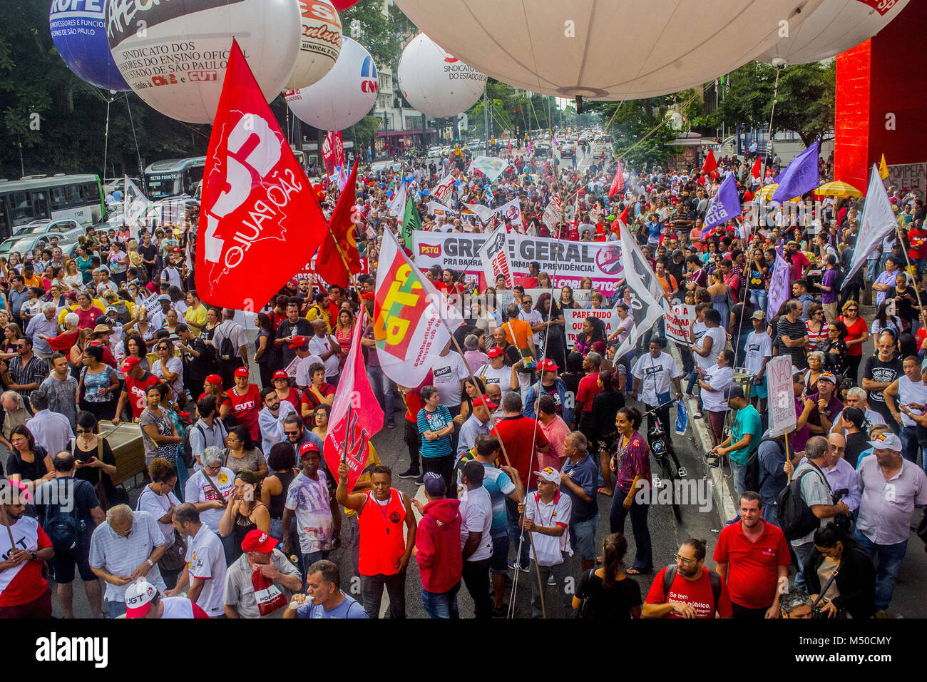 Sao Paulo, Brazil. February 19, 2018 - Demonstrators take part in a protest against the social welfare reform bill introduced by President Michel Temer government which seeks to extend the years of contributions and raise the minimum age for retirement, in Sao Paulo, Brazil, on February 19, 2018. Credit: Cris Faga/ZUMA Wire/Alamy Live News Stock Photo