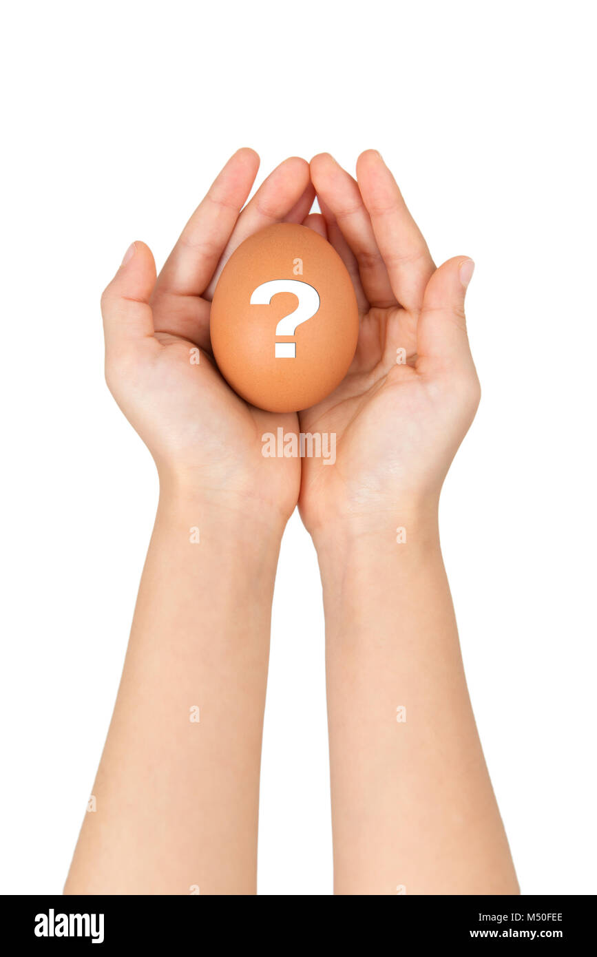 Little girl holding an egg Stock Photo