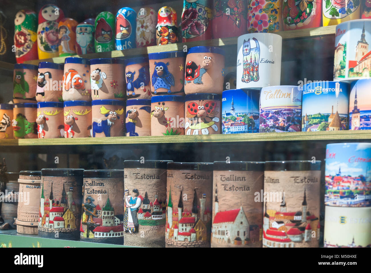 Souvenir mugs in the shop window in Tallinn Stock Photo