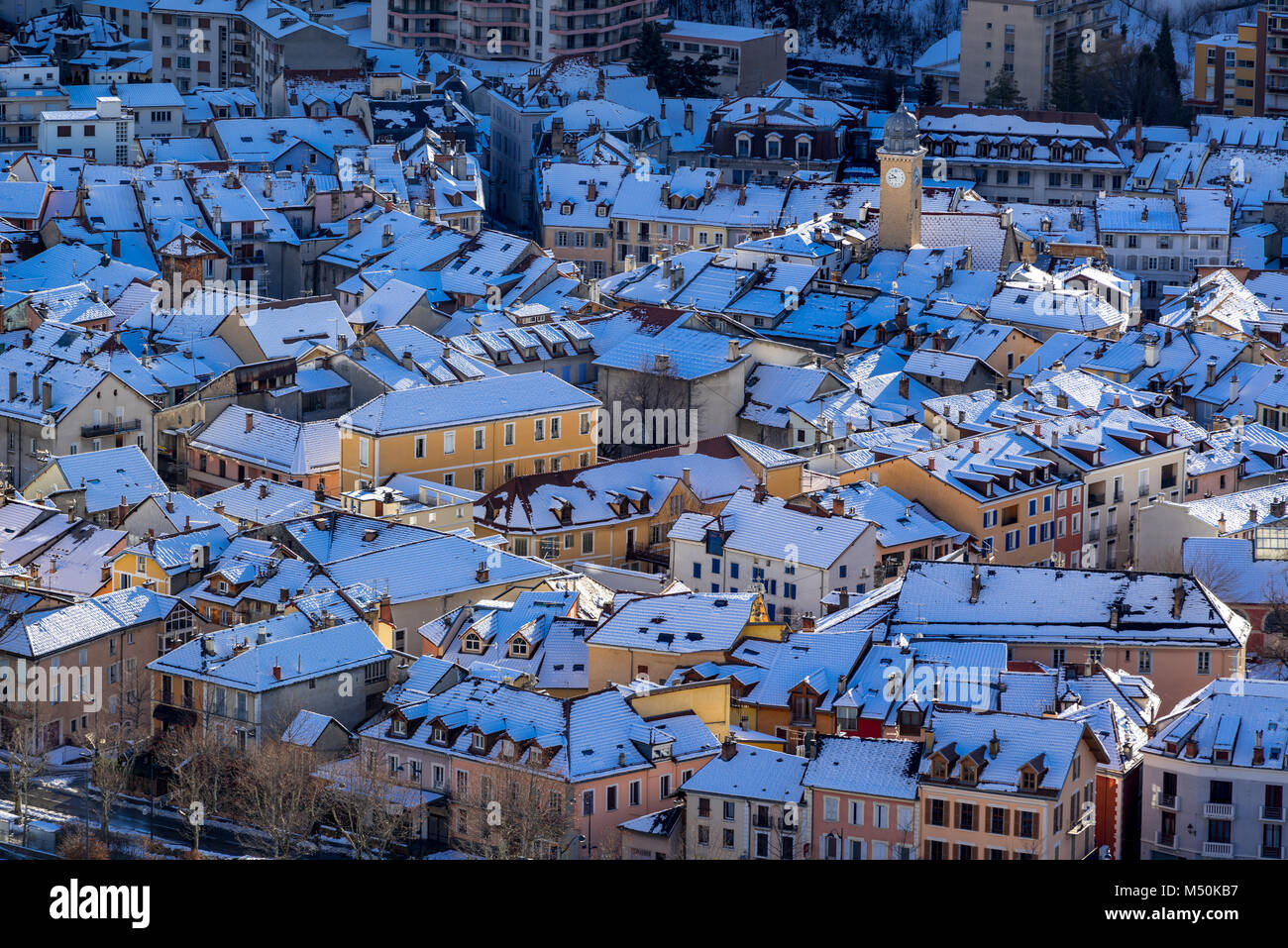 Aerial Winter view of snow covered rooftops in the city of Gap Stock Photo  - Alamy