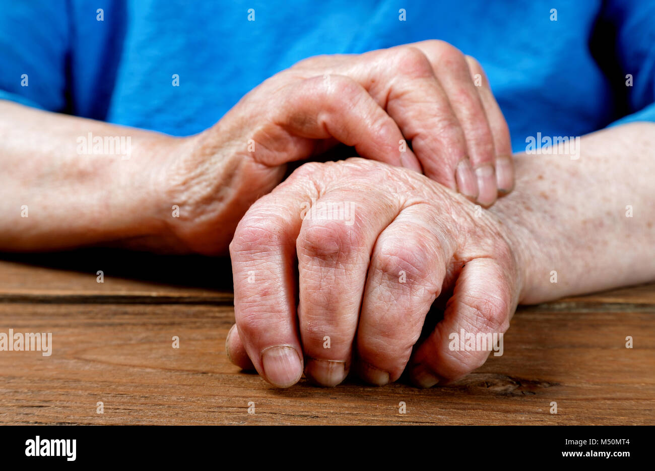 Elderly Woman's Hands Fastening Her Bra Stock Photo, Picture and Royalty  Free Image. Image 42355826.
