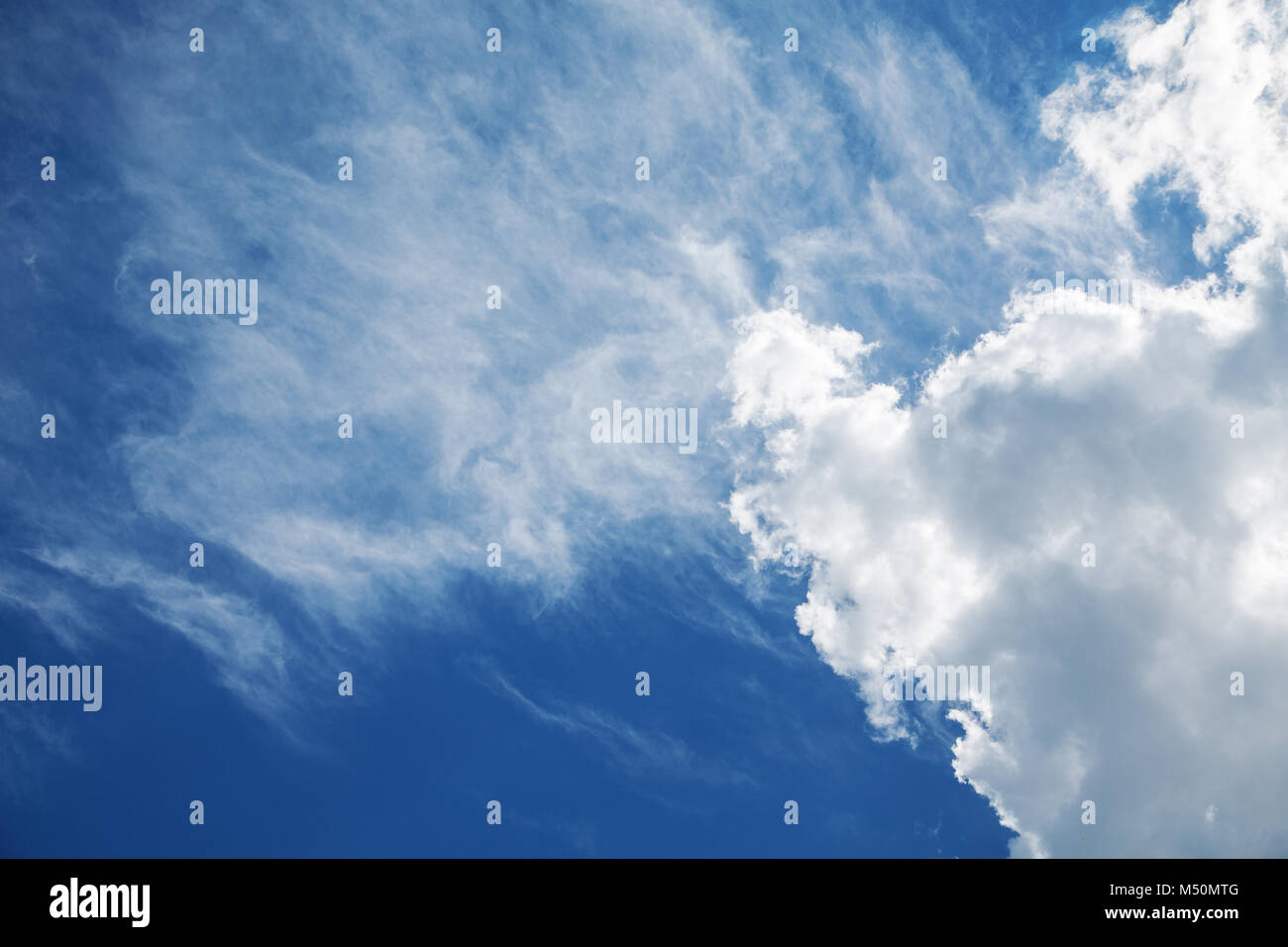stratocumulus clouds and the dark blue sky Stock Photo