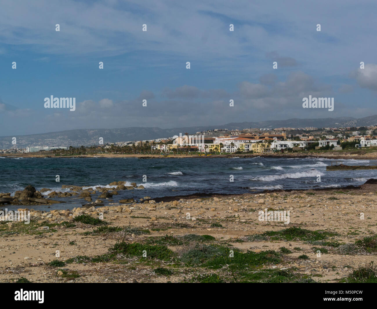 View from Paphos coastal path towards Kefalos Beach Old Market Area Panp Pafos Upper Pafos Cyprus on a lovely February winters day weather Stock Photo