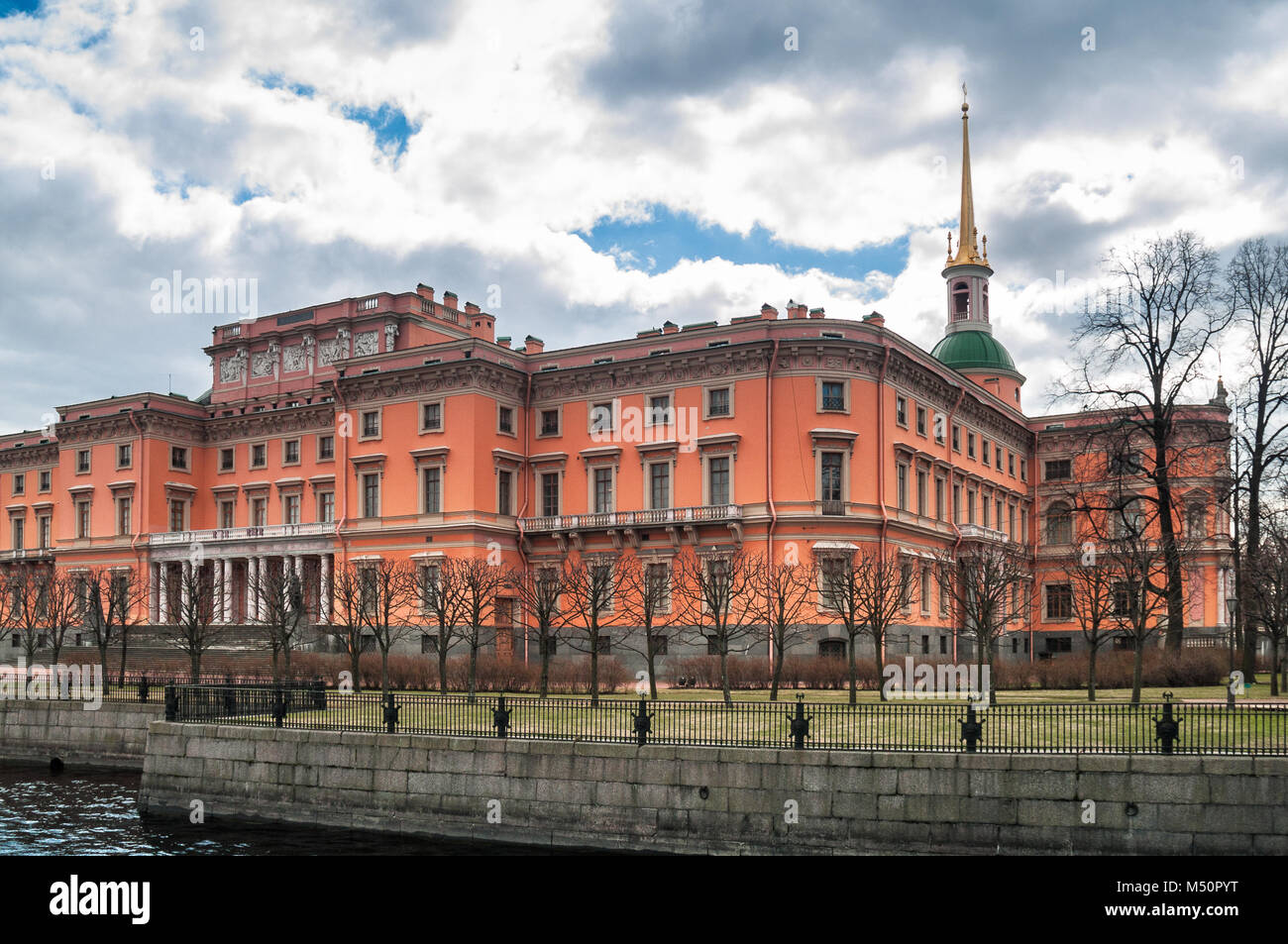 Mikhailovsky Castle from the Moika River opposite the Summer Garden in the city of St. Petersburg in the early spring in April in the afternoon Stock Photo