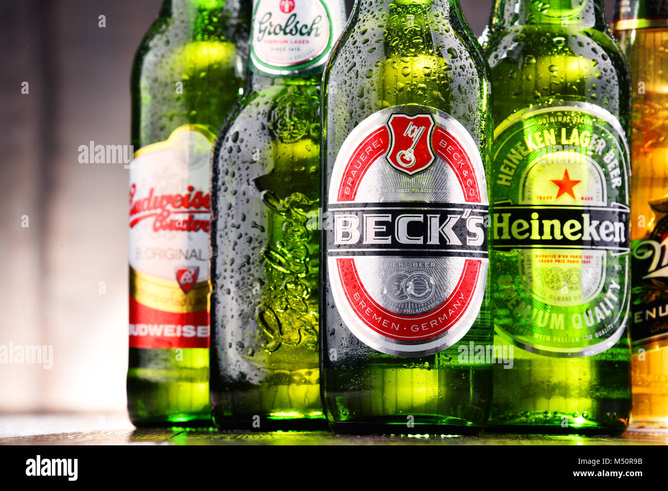 Bottles of assorted global beer brands Stock Photo Alamy