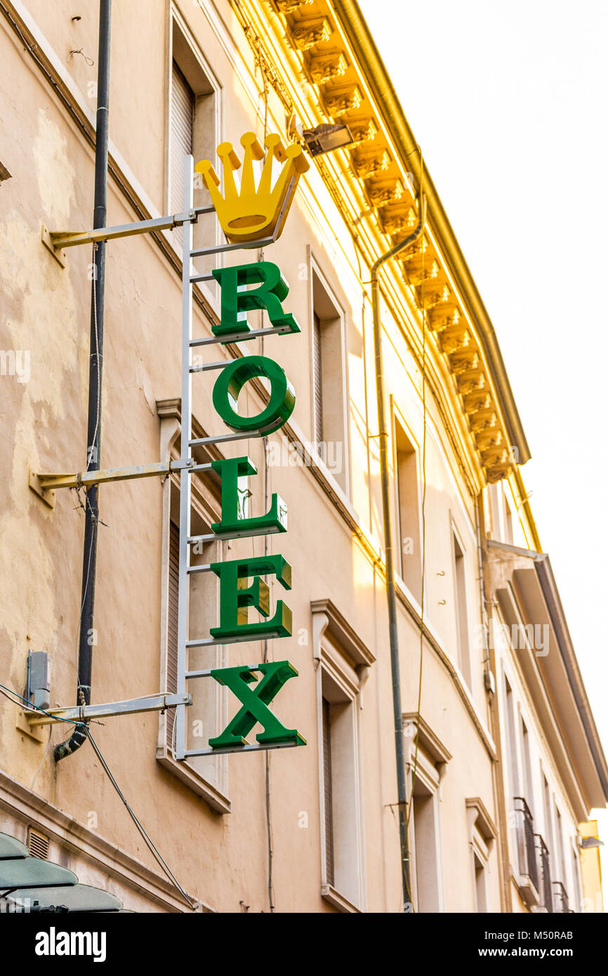 RAVENNA, ITALY - FEBRUARY 15, 2018: ROLEX logo of street shop. Apple sold more watches than Rolex Stock Photo