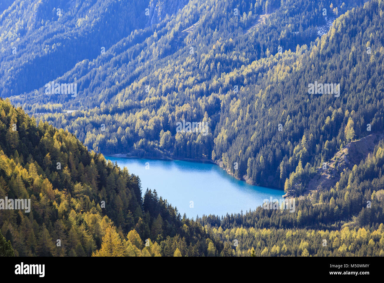 Glacial lake in the mountain forest Stock Photo