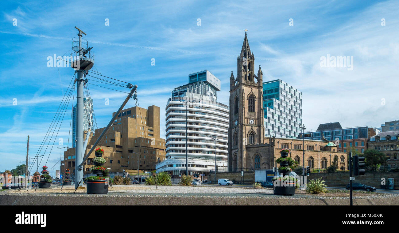 Church of Our Lady and Saint Nicholas, Liverpool, the parish church of Liverpool in front of more modern buildings. Stock Photo